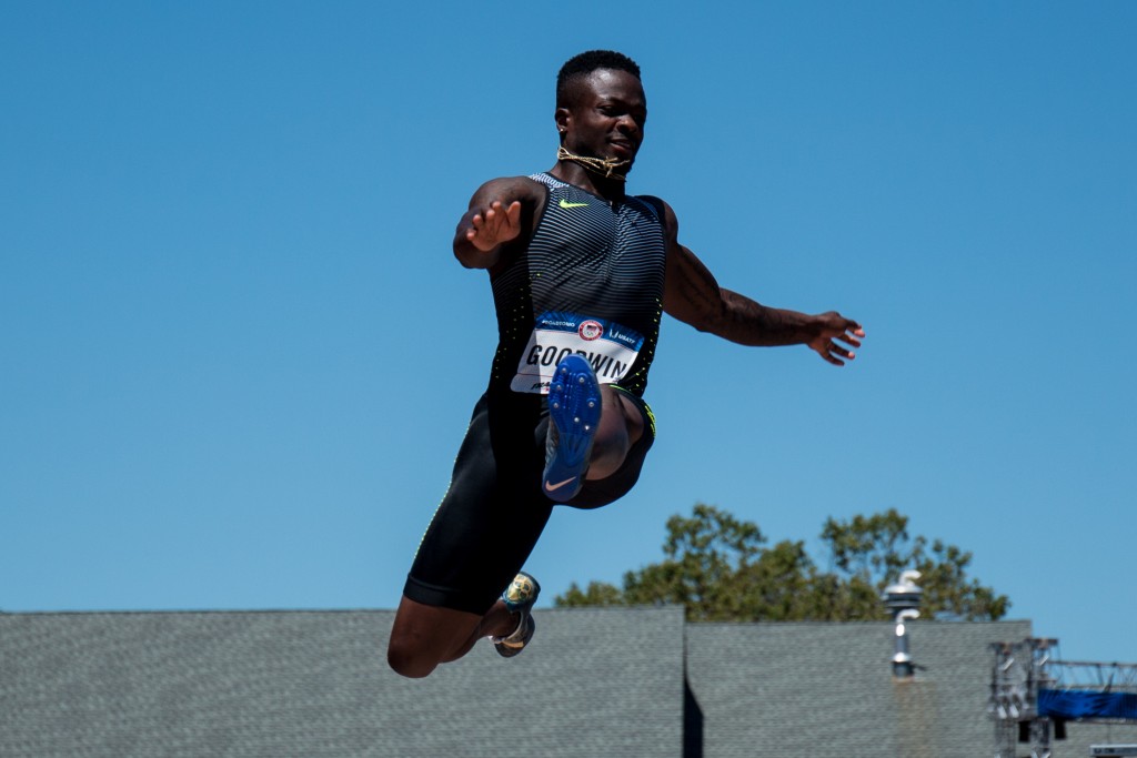 Marquise Goodwin, wide receiver and punt retuner for the Buffalo Bills, soars through the air in the long jump. He finished 12 was was the last qualifier for Sunday's final. Photo by Dillon Vibes